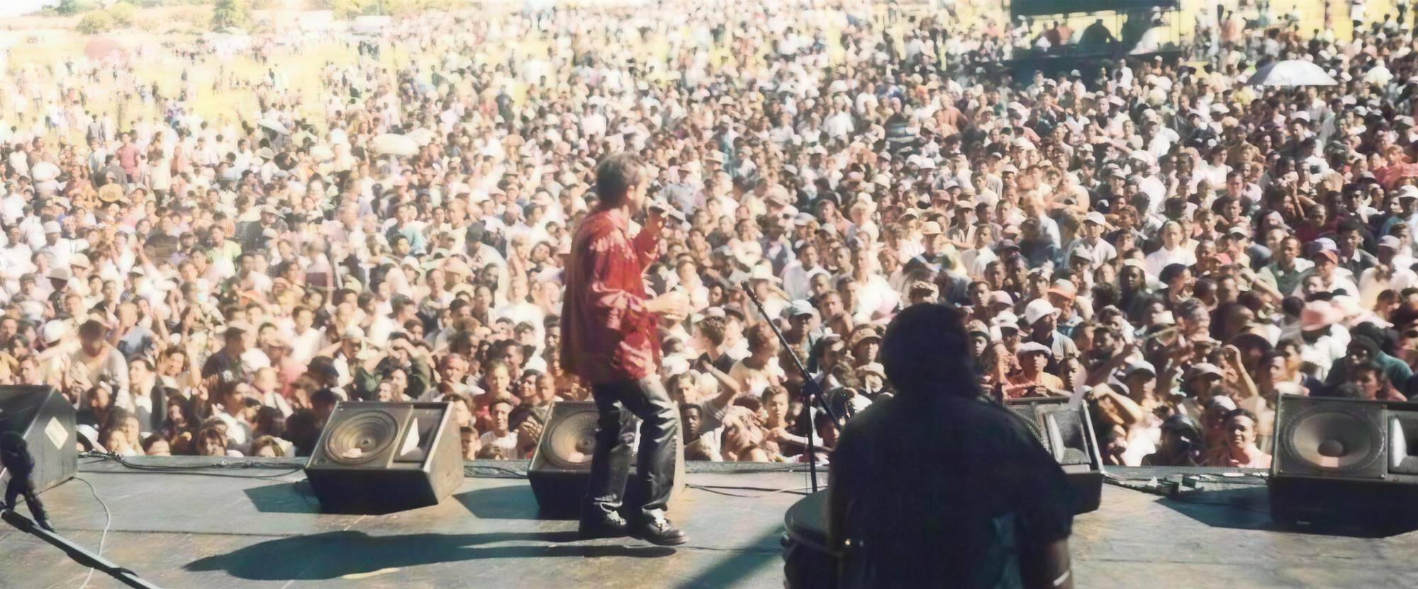 John Pretorius on stage in front of an enormous crowd