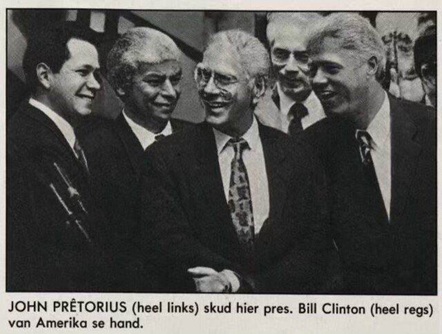 Newspaper clipping of John Pretorius meeting US President Bill Clinton