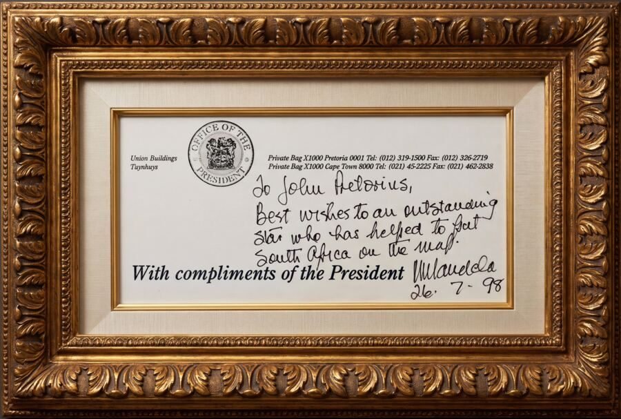 Framed handwritten note from President Nelson Mandela to John Pretorius, dated 26 July 1998